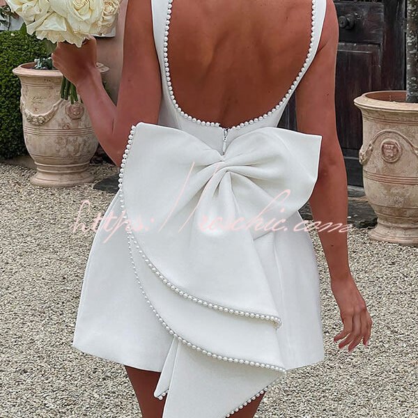 Stylish Pearl-embellished Large Bow Slim-fit Mini Dress